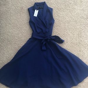 Beautiful classic navy wrap dress with tie waist